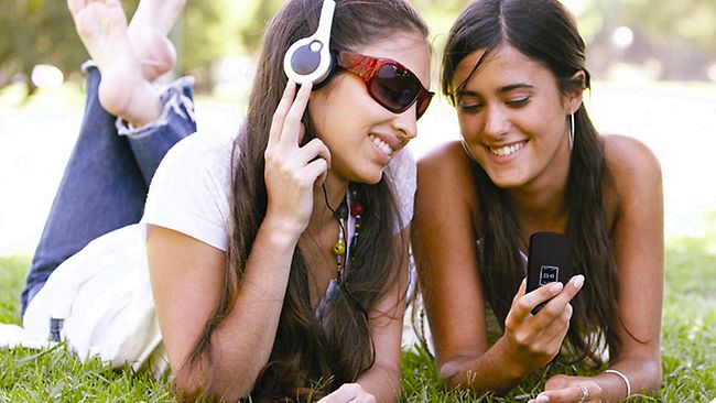 teenagers listening to music