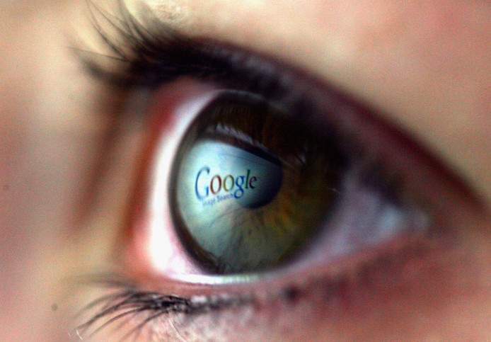 LONDON - FEBRUARY 03: In this photo illustration the Google logo is reflected in the eye of a girl on February 3, 2008 in London, England. Financial experts continue to evaluate the recent Microsoft $44.6 billion (?22.4 billion) offer for Yahoo and the possible impact on Internet market currently dominated by Google. (Photo by Chris Jackson/Getty Images)