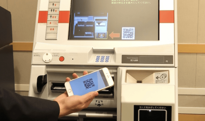 鐵路售票機變提款機　日本鐵路同銀行合作手機可撳錢