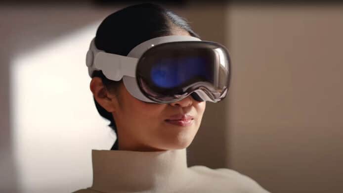A woman wearing Apple Vision Pro