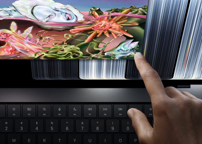 Apple 首款觸控 MacBook Pro 渲染圖 觸控 MacBook Pro 螢幕顯示豐富彩色畫面.